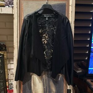 Brand new black lace jacket w/tags. It’s a size Large and never worn